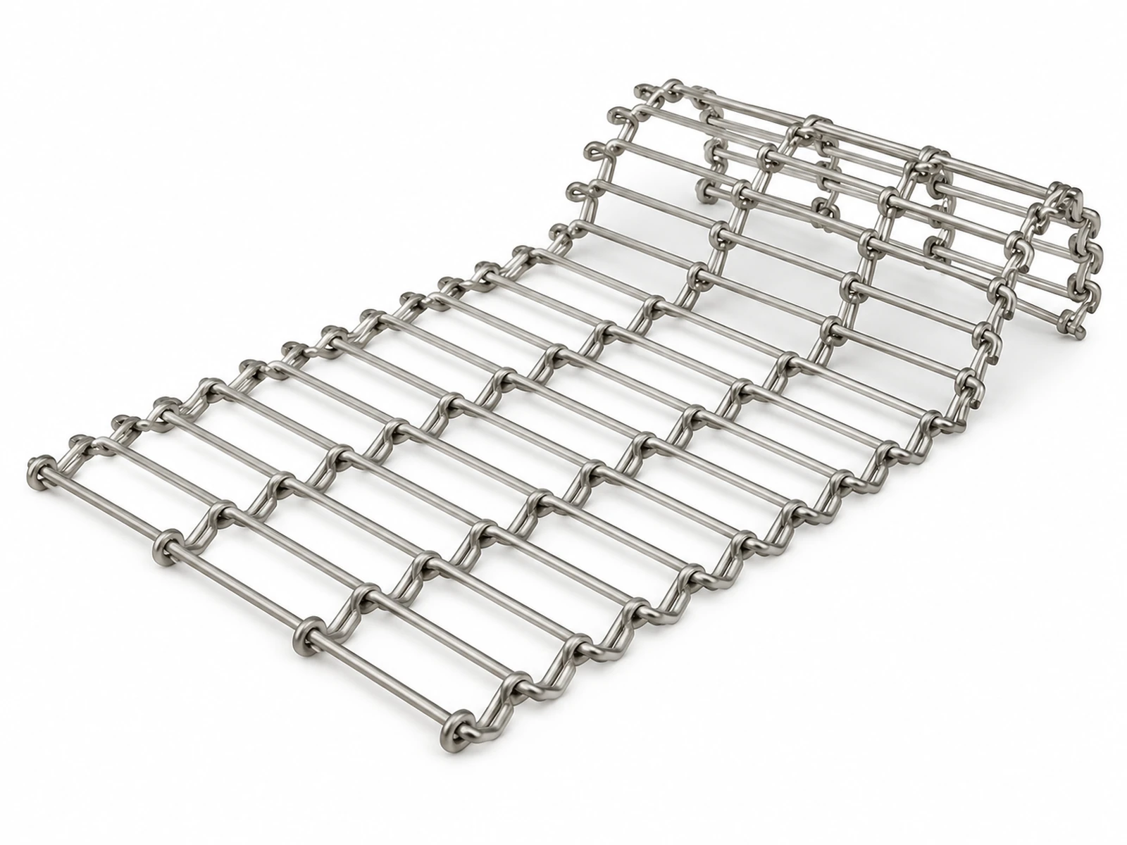 A stainless steel flat-flex mesh conveyor belt carrying golden potato chips out of an industrial fryer, steam rising
