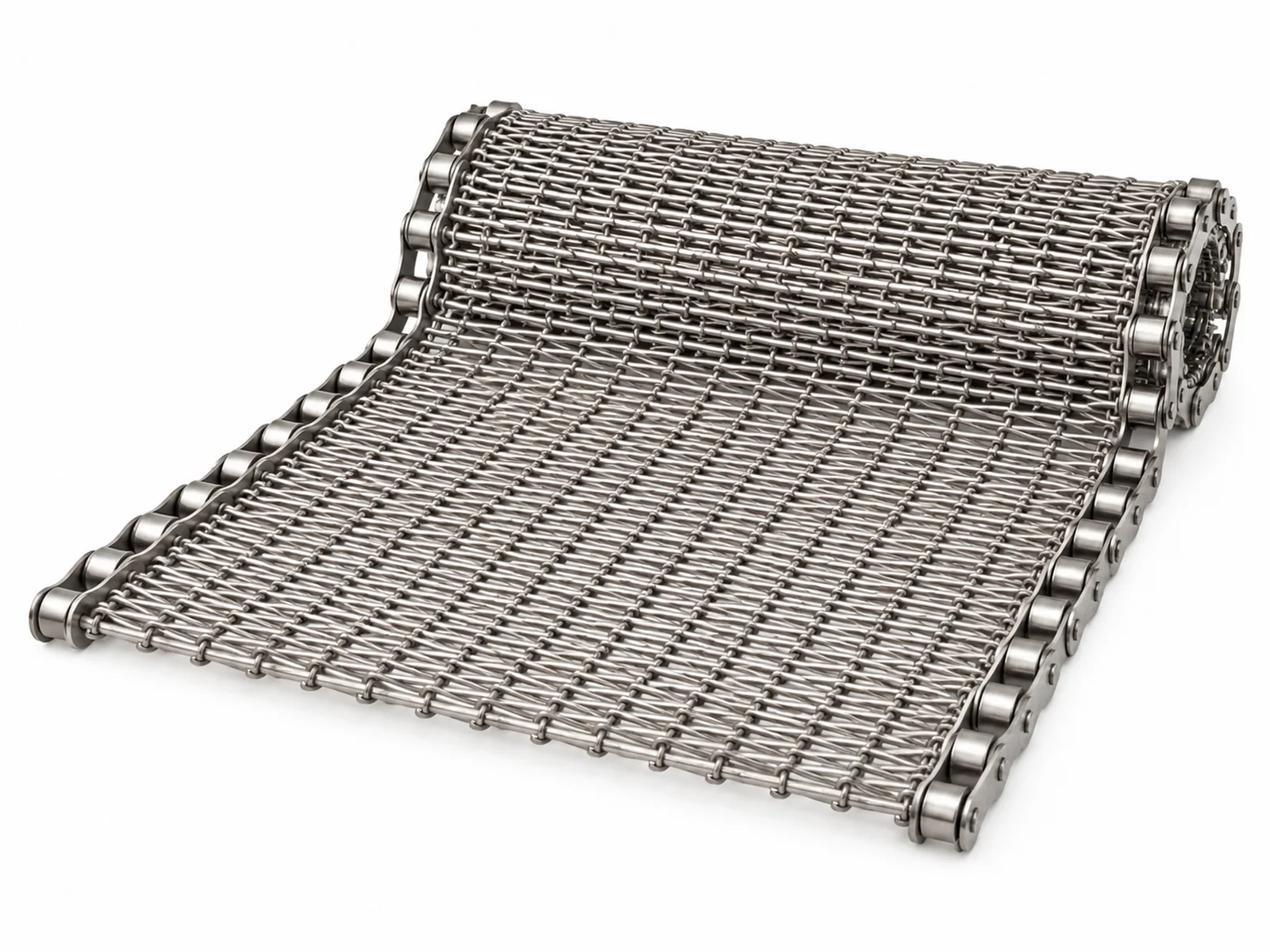 A wide stainless steel balanced-weave metal mesh conveyor belt running out of an industrial furnace