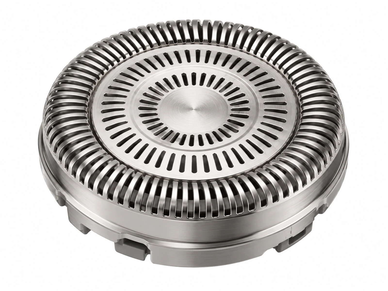 Close-up of a rotary electric shaver with three round stainless steel slotted guard caps showing concentric slot rings