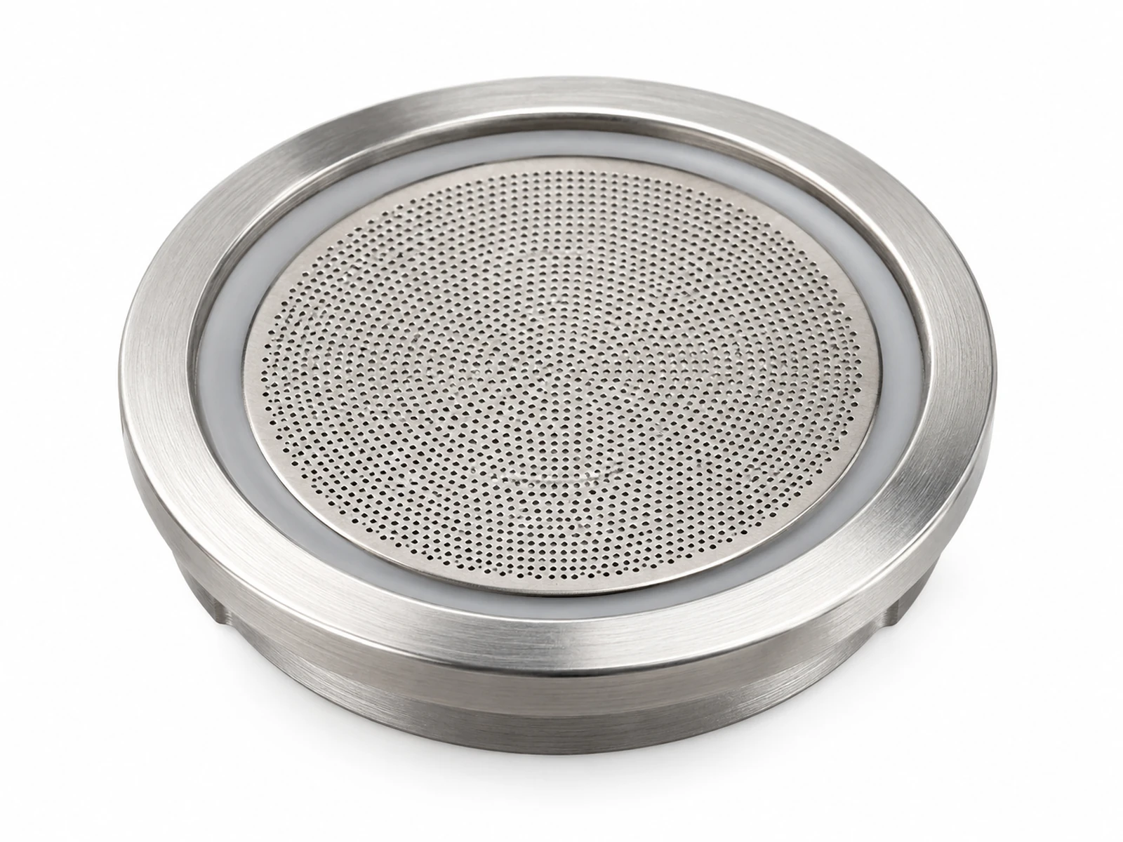 Microscope-style macro image of a small round metal nebulizer mesh plate with a dense central field of microscopic holes